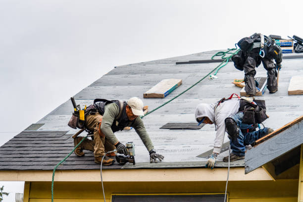Professional Gutter Installation technician working in Lyndon, KS